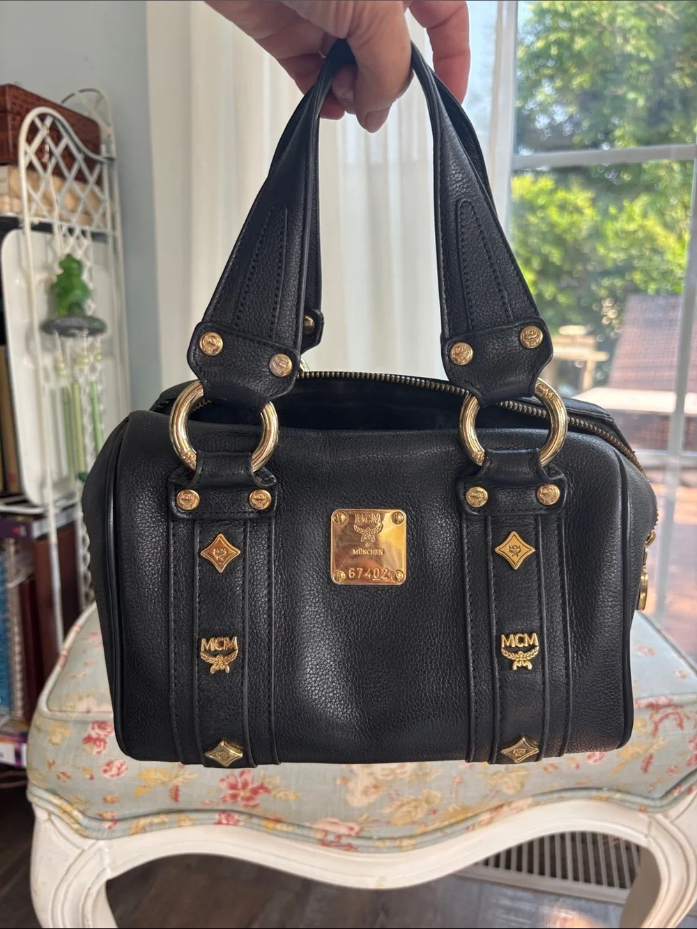MCM Black Leather Satchel with Gold Hardware Accents